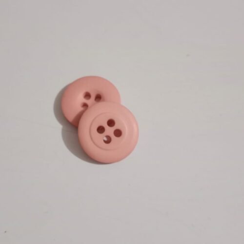 Botón color salmón mediano precio 200 unidad