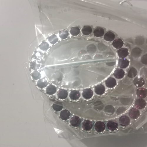 Pasador perlas moradon precio 1500 unidad